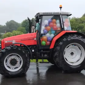 Tractor at a school fair: Click Here To View Larger Image