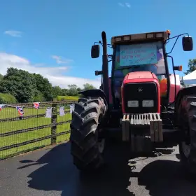 Tractor with balloons at a school fair: Click Here To View Larger Image